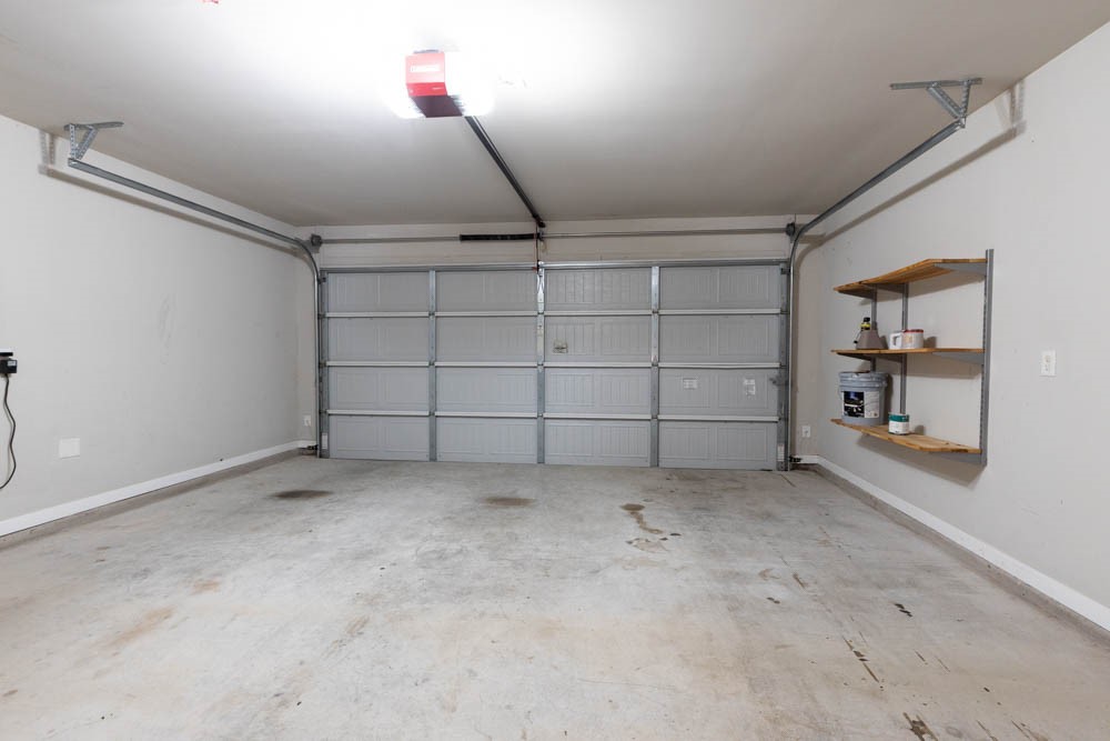 1001 Rootstock Rd. Brenham, TX 77833 - Photo 26 of 28 Two car attached garage.