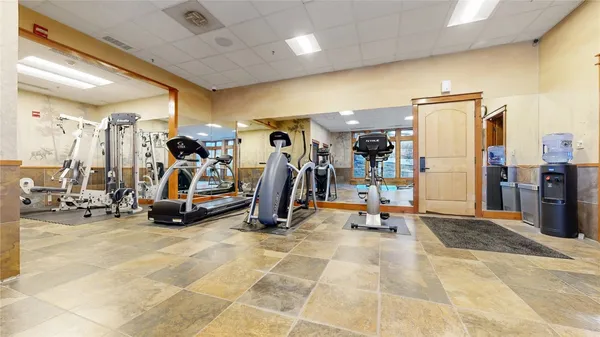a view of a room with gym equipment