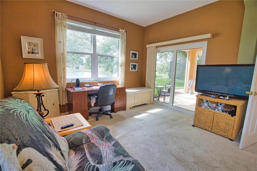 5288 Layton Drive Venice, FL 34293 - Photo 34 of 75 a view of a livingroom with workspace and a window