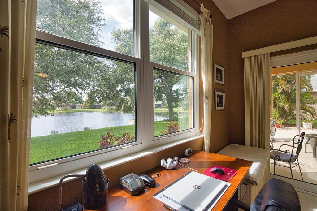 5288 Layton Drive Venice, FL 34293 - Photo 35 of 75 a room with furniture and a window