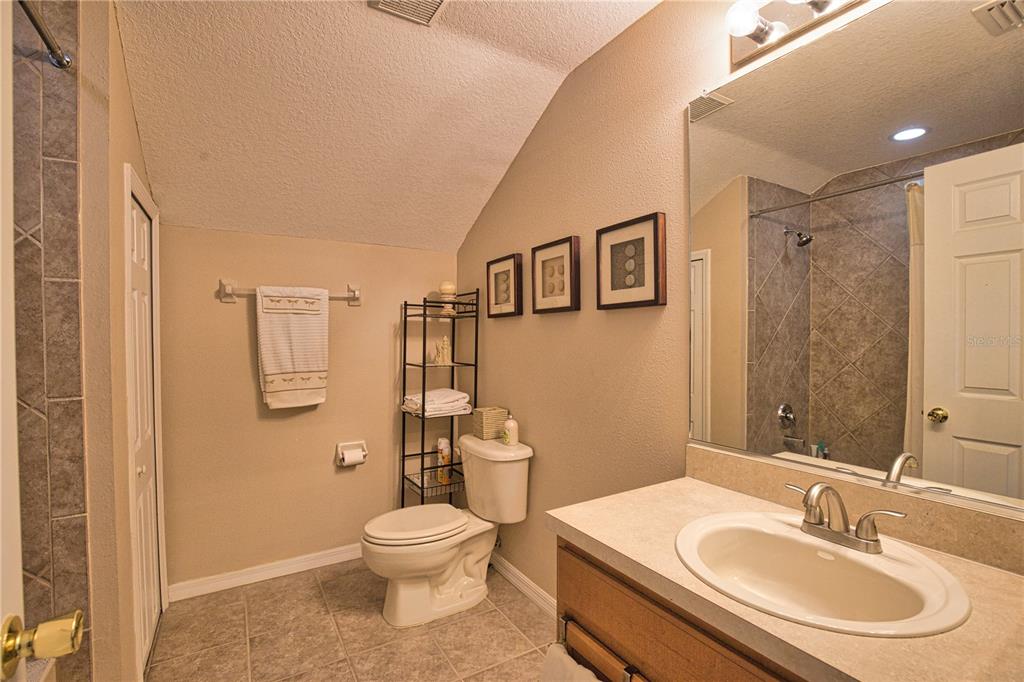 5288 Layton Drive Venice, FL 34293 - Photo 47 of 75 a bathroom with a toilet sink and mirror