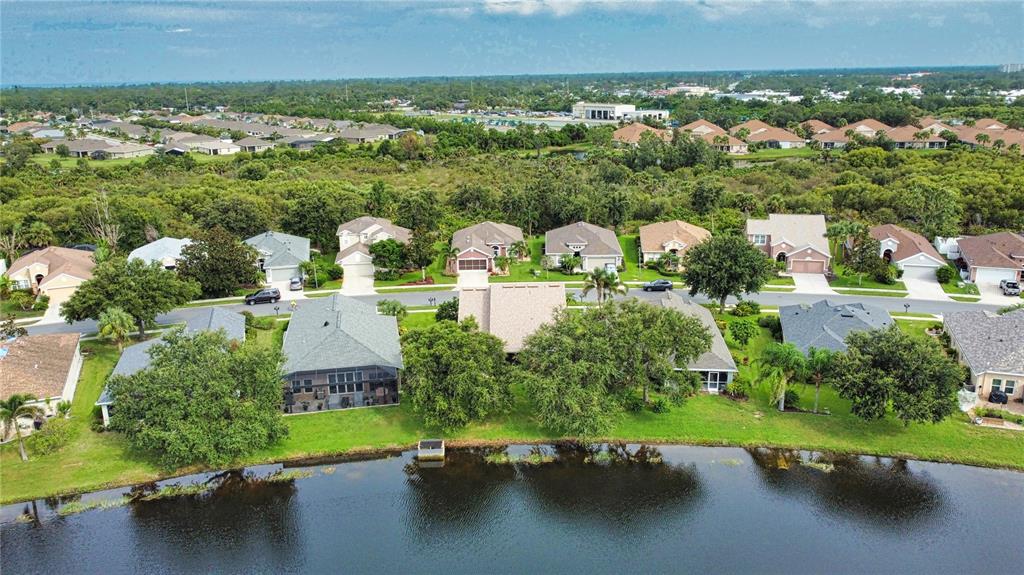 5288 Layton Drive Venice, FL 34293 - Photo 69 of 75 an aerial view of a houses with a yard and lake view