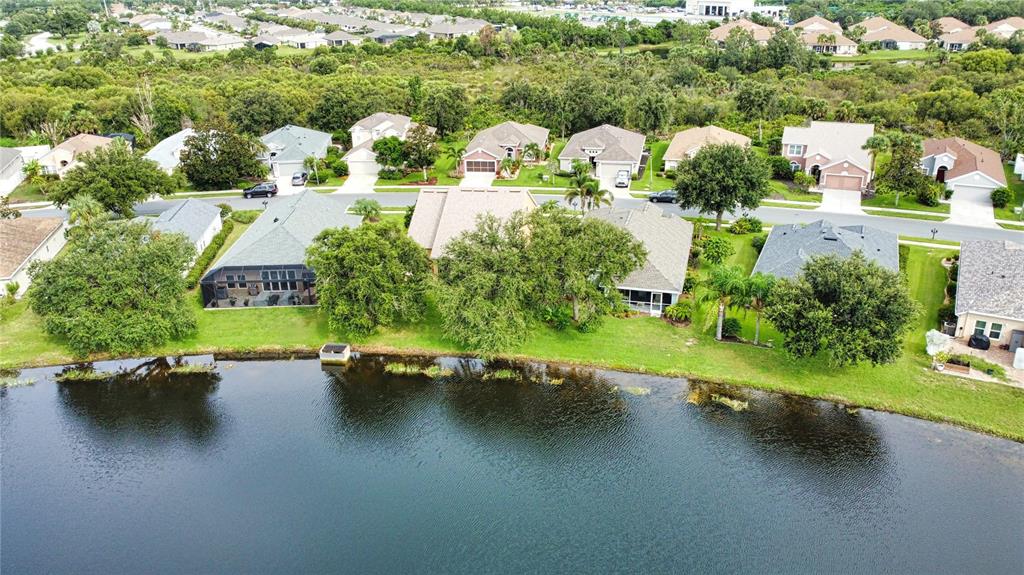 5288 Layton Drive Venice, FL 34293 - Photo 71 of 75 an aerial view of a house with yard swimming pool and outdoor seating