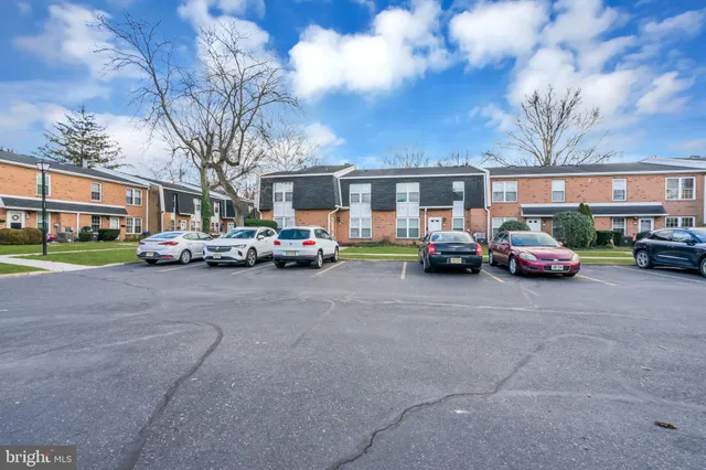 a cars parked in front of a building