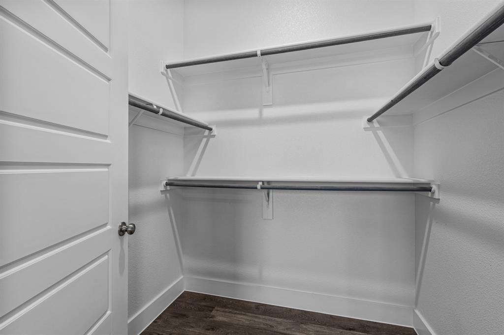 3281 Ganzer Road West, Unit 817A Denton, TX 76207 - Photo 39 of 40 a view of walk in closet with empty racks