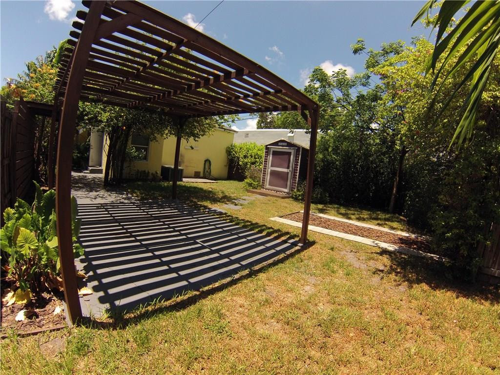 1719 Adams Street Hollywood, FL 33020 - Photo 17 of 29 a view of a backyard with sitting area