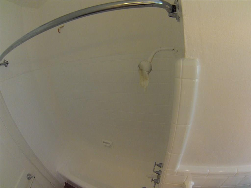 1719 Adams Street Hollywood, FL 33020 - Photo 23 of 29 a close up of a shower