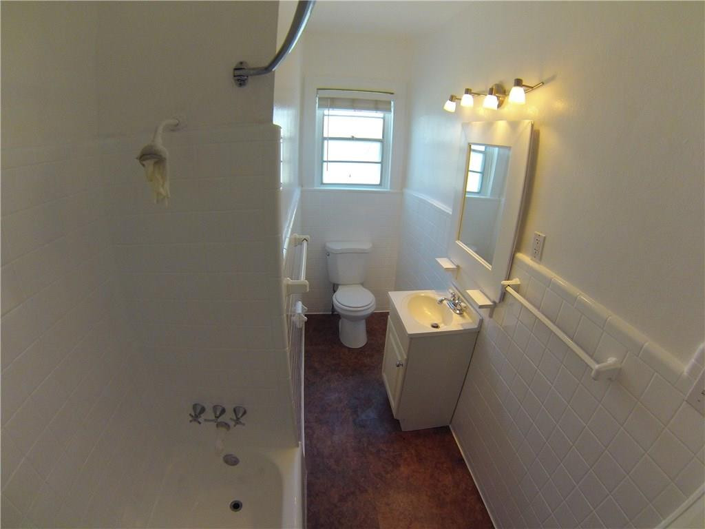 1719 Adams Street Hollywood, FL 33020 - Photo 25 of 29 a bathroom with a bathtub and shower