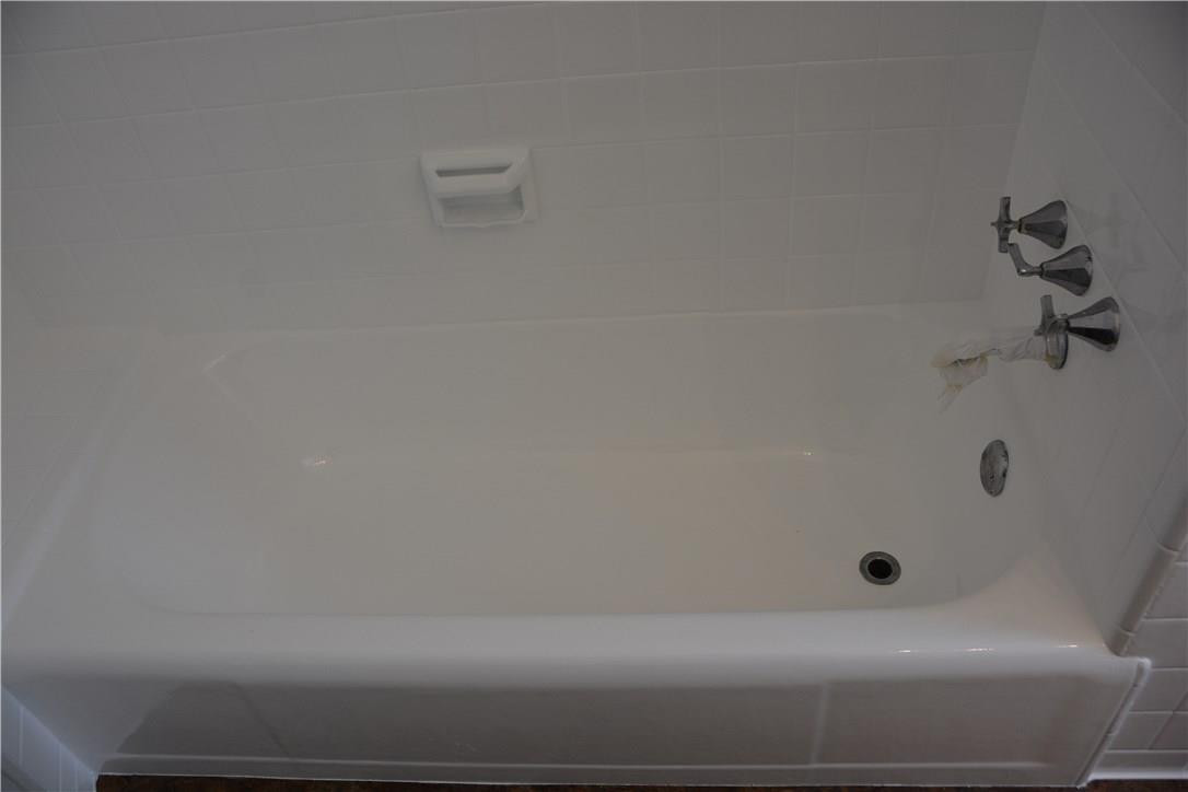 1719 Adams Street Hollywood, FL 33020 - Photo 28 of 29 a bathroom with a bathtub