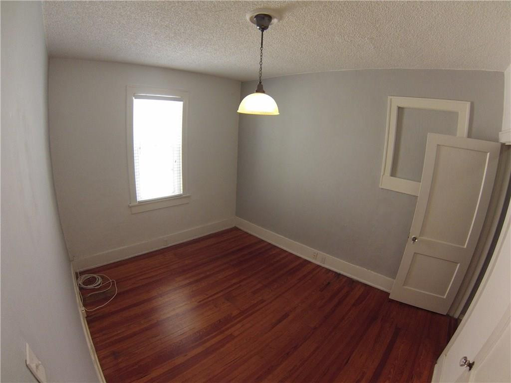 1719 Adams Street Hollywood, FL 33020 - Photo 8 of 29 a view of a room with wooden floor and windows