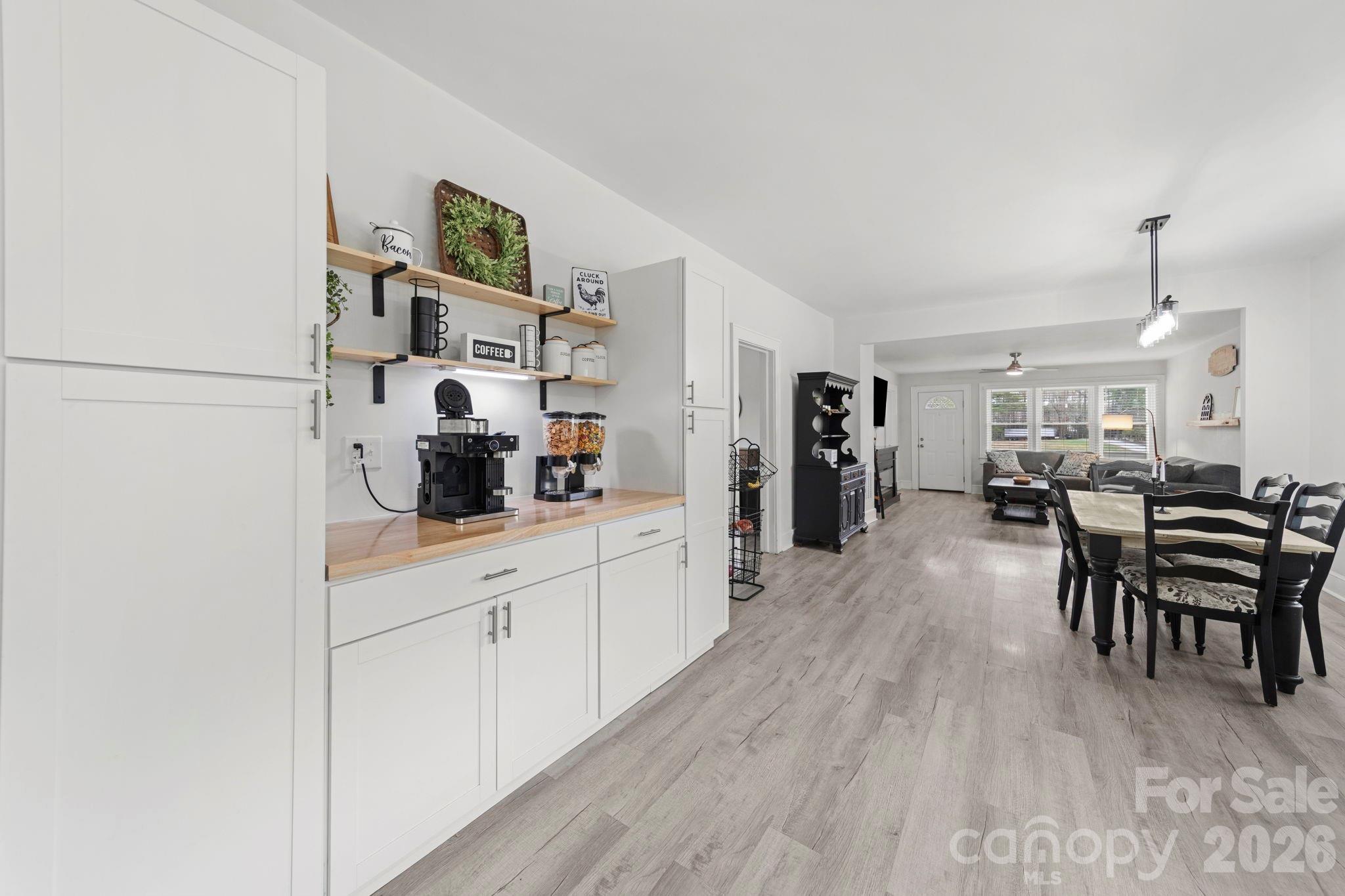 36141 Palestine Road Albemarle, NC 28001 - Photo 14 of 40 a large white kitchen with cabinets