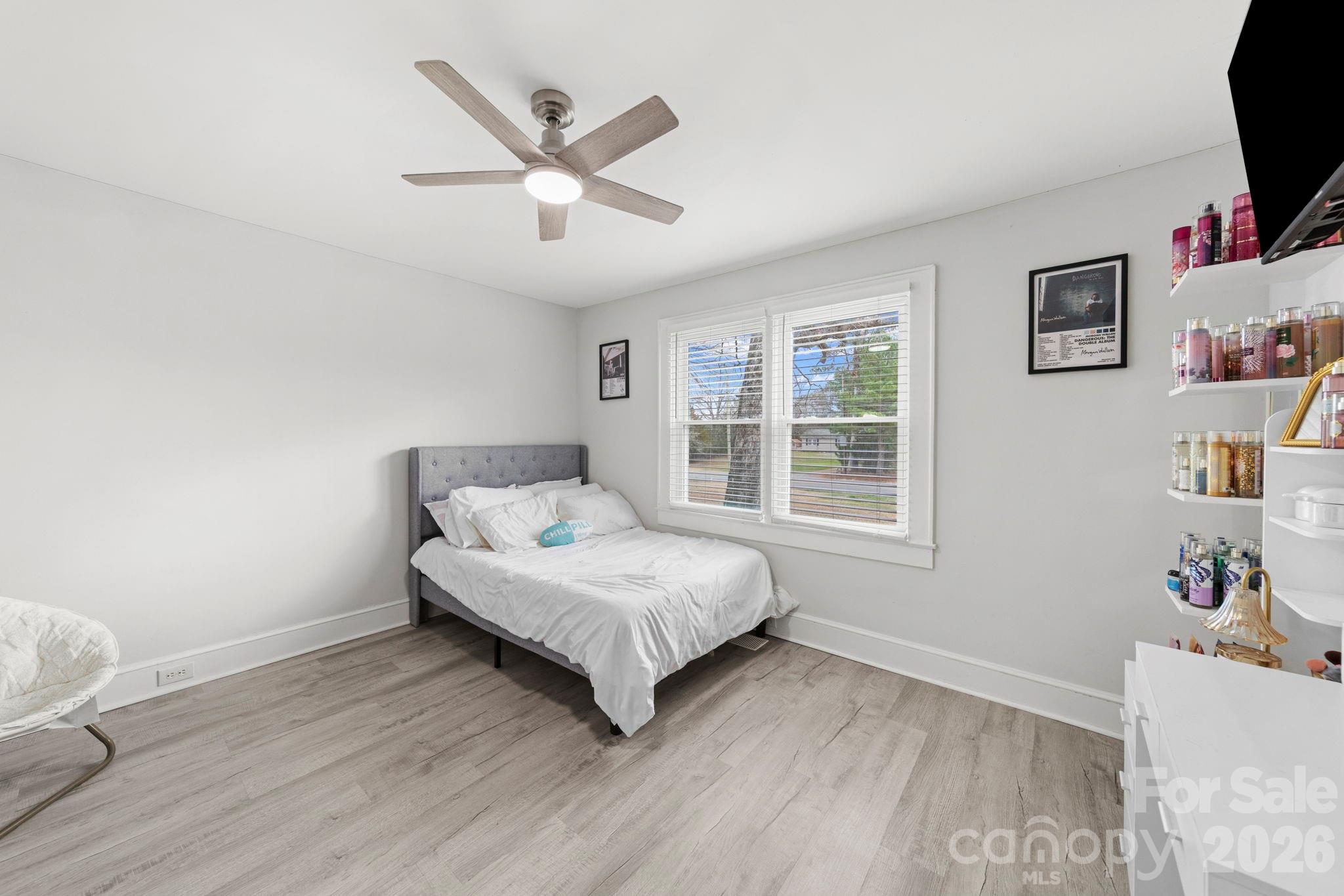 36141 Palestine Road Albemarle, NC 28001 - Photo 16 of 40 a living room with a bed furniture and a window