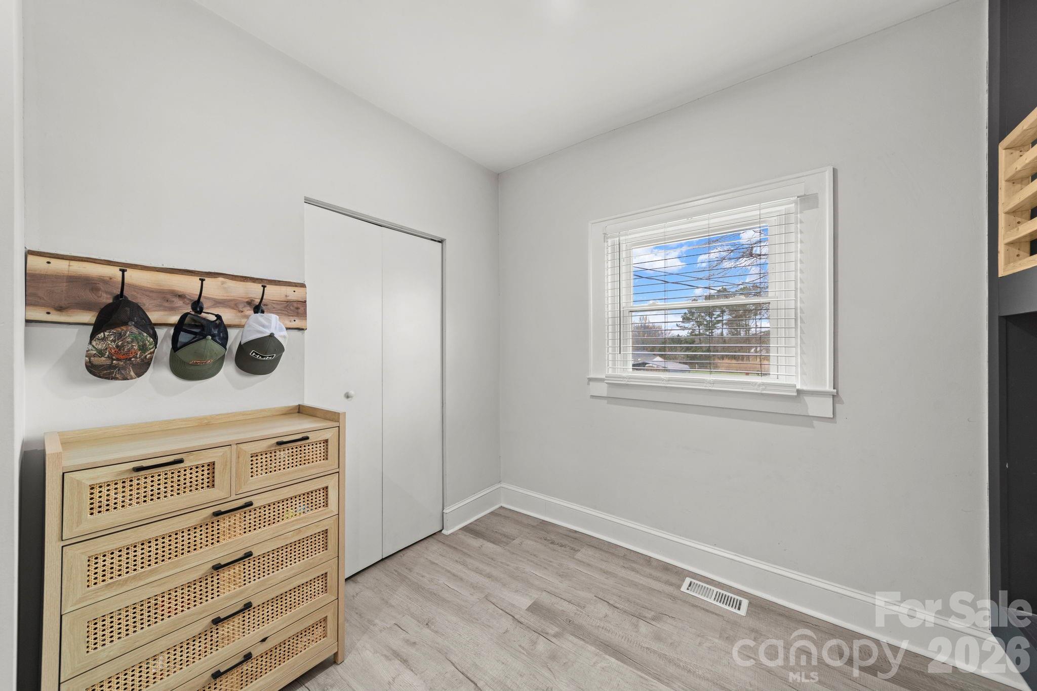36141 Palestine Road Albemarle, NC 28001 - Photo 24 of 40 a view of a storage and utility room with wooden floor