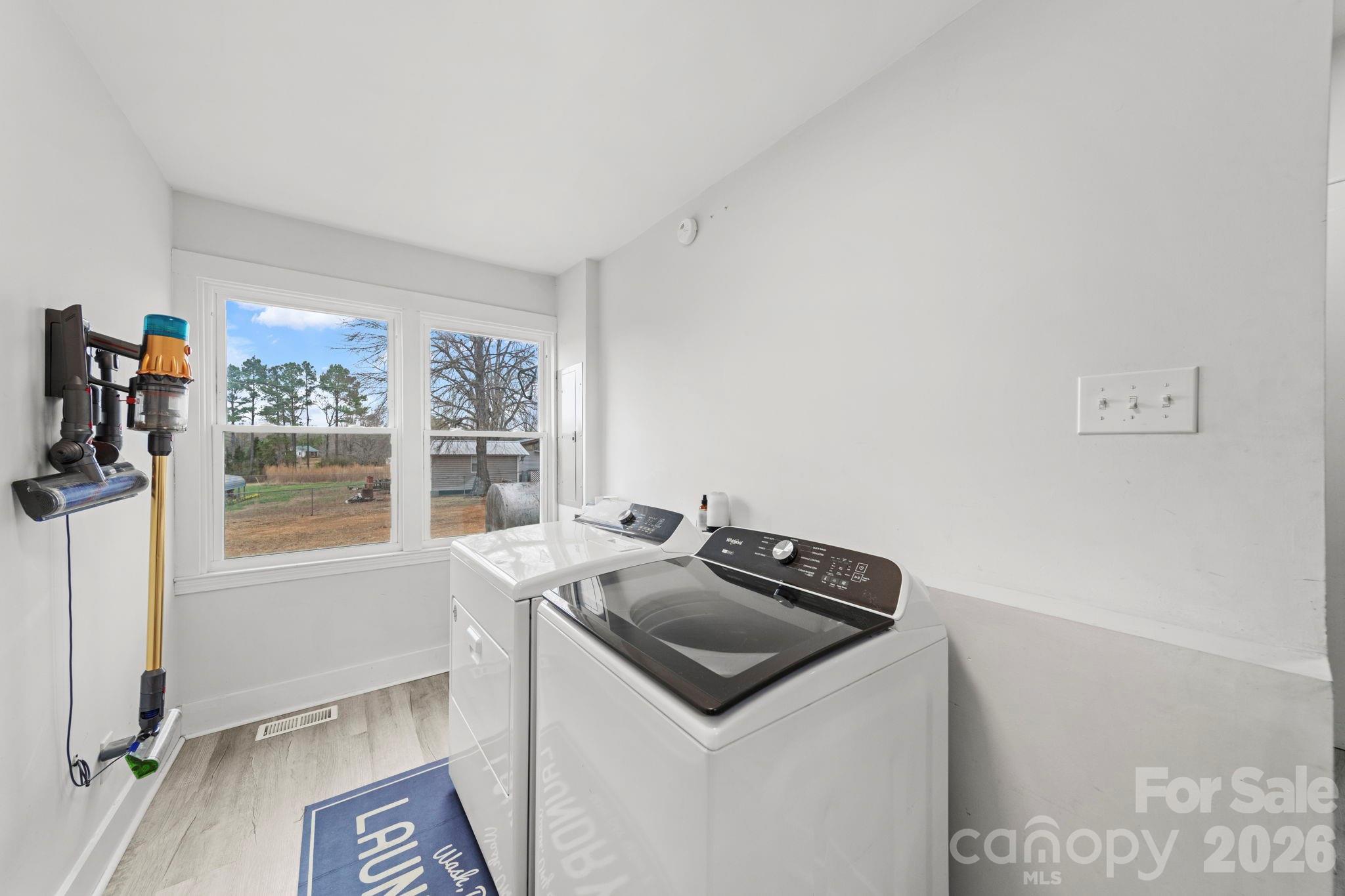 36141 Palestine Road Albemarle, NC 28001 - Photo 26 of 40 a utility room with sink dryer and washer