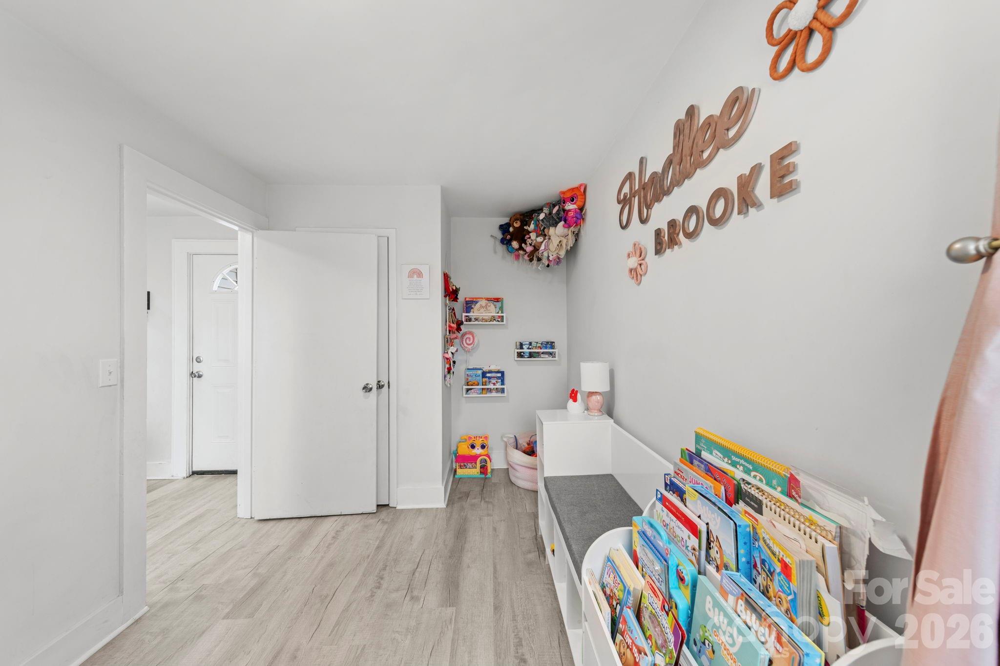 36141 Palestine Road Albemarle, NC 28001 - Photo 28 of 40 a room with toys and wooden floor