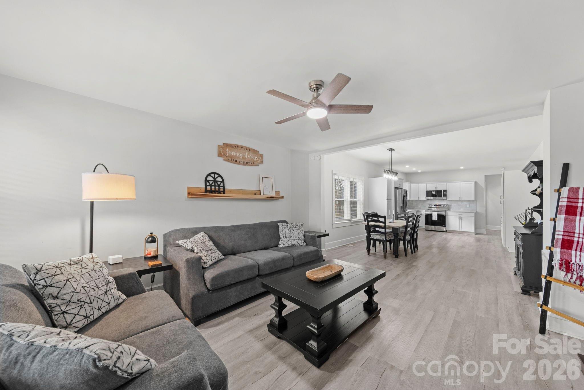 36141 Palestine Road Albemarle, NC 28001 - Photo 3 of 40 a living room with furniture and wooden floor