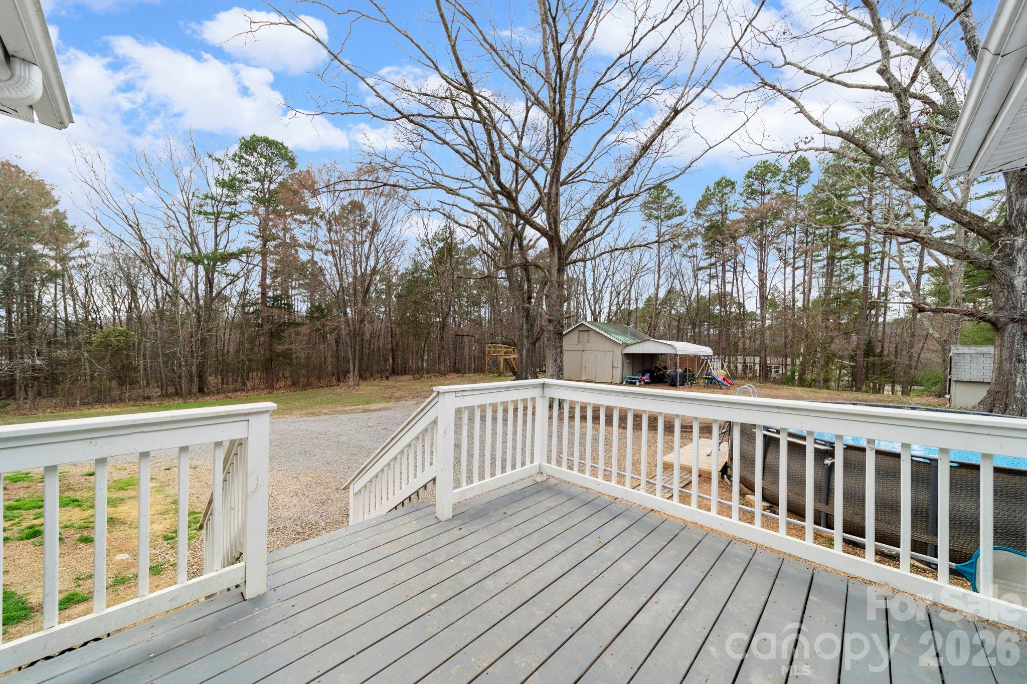 36141 Palestine Road Albemarle, NC 28001 - Photo 31 of 40 a view of a wooden roof deck