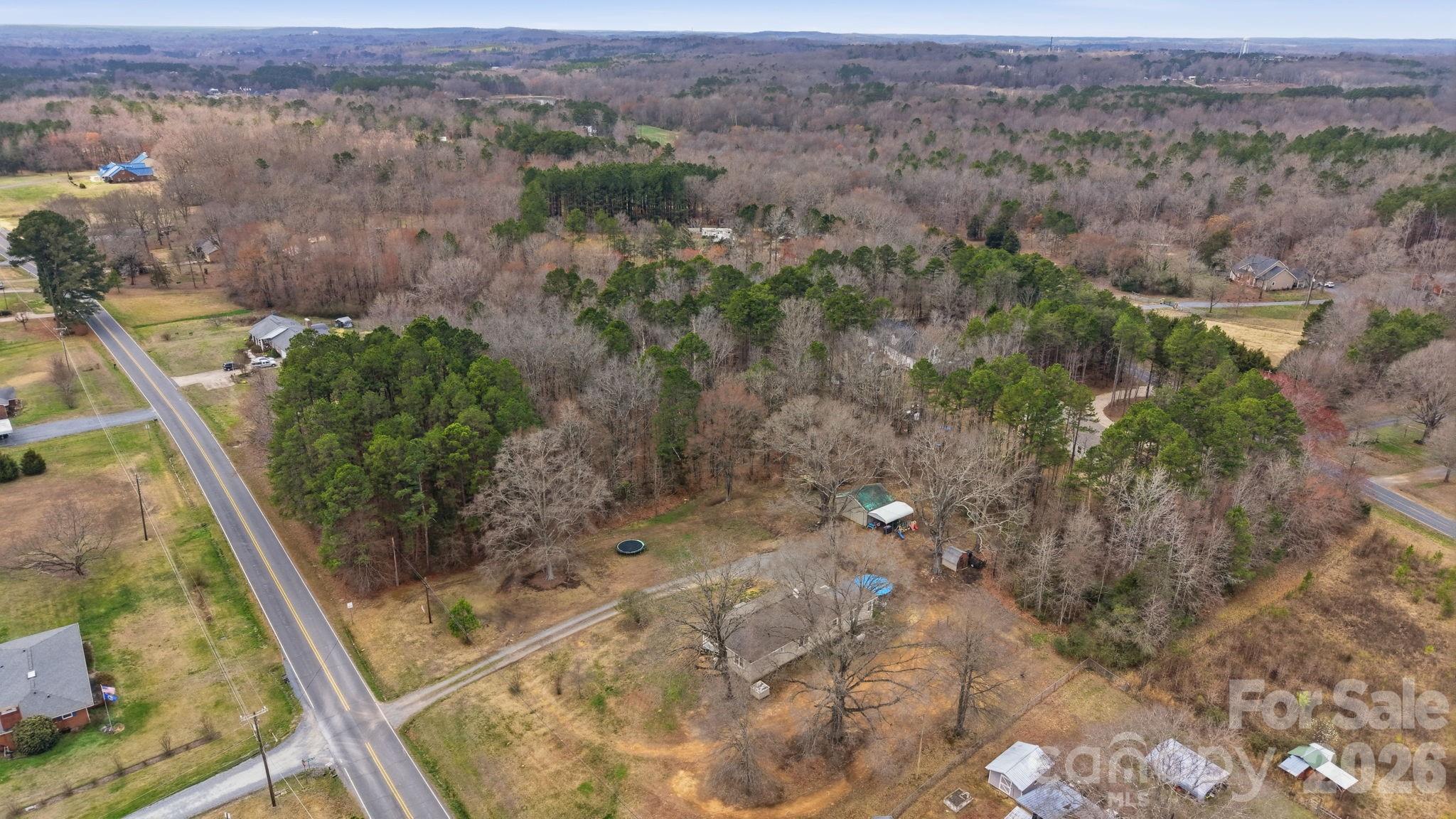 36141 Palestine Road Albemarle, NC 28001 - Photo 38 of 40 a view of a yard with an outdoor space