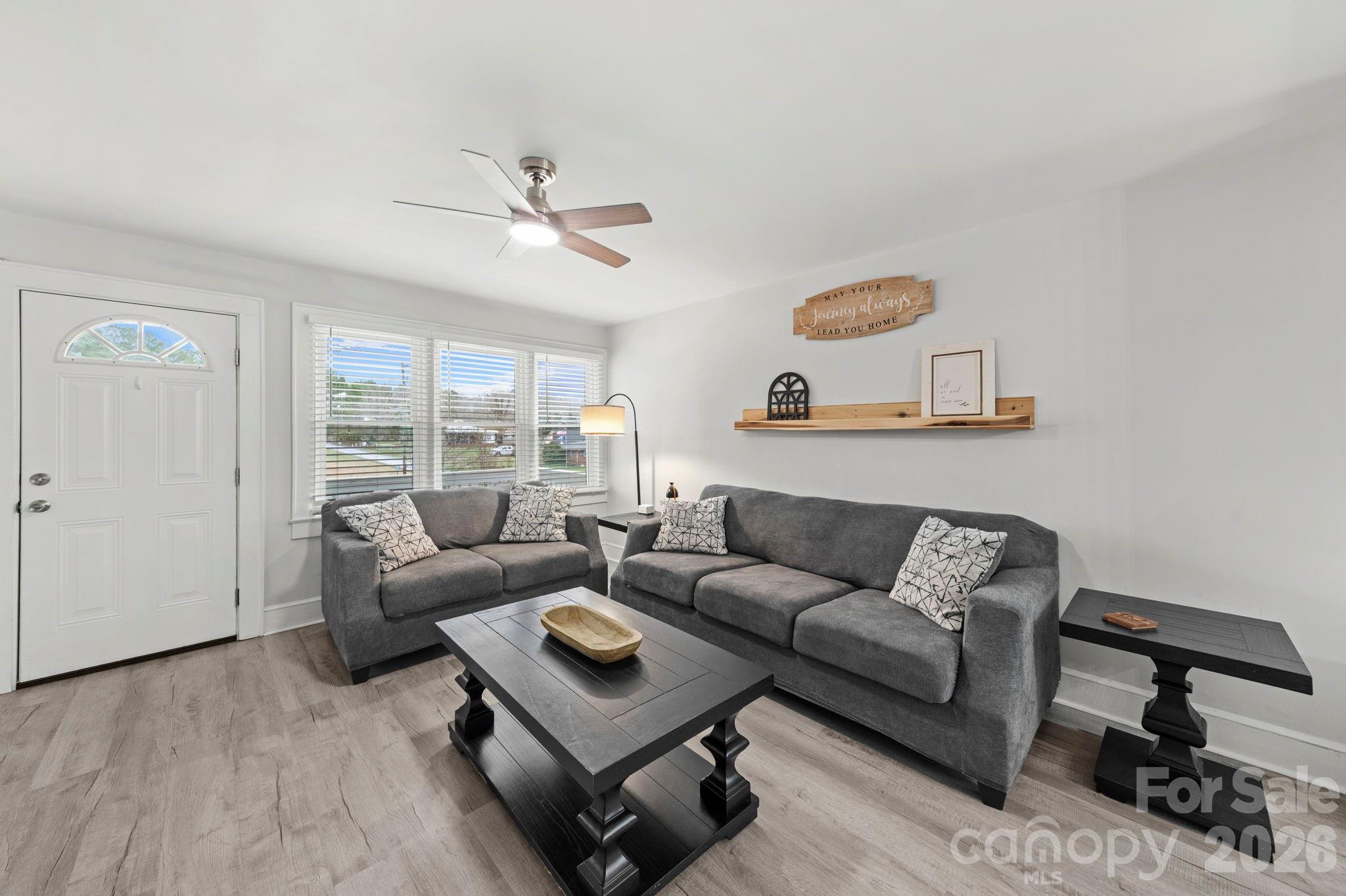 36141 Palestine Road Albemarle, NC 28001 - Photo 4 of 40 a living room with furniture and a large window
