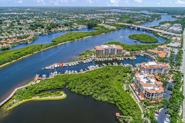 an aerial view of a city with lake view