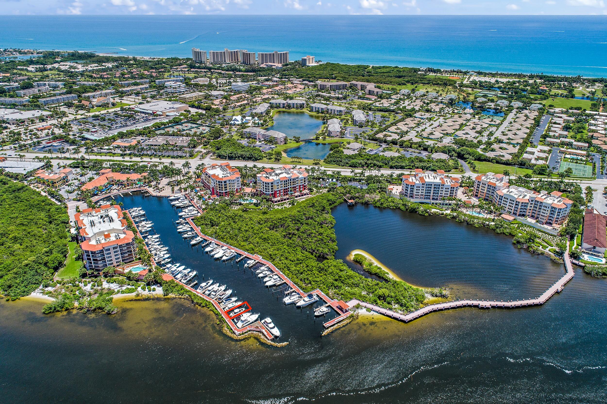 348 Highway 1, Unit 4 Jupiter, FL 33477 - Photo 3 of 6 an aerial view of residential houses with outdoor space and trees
