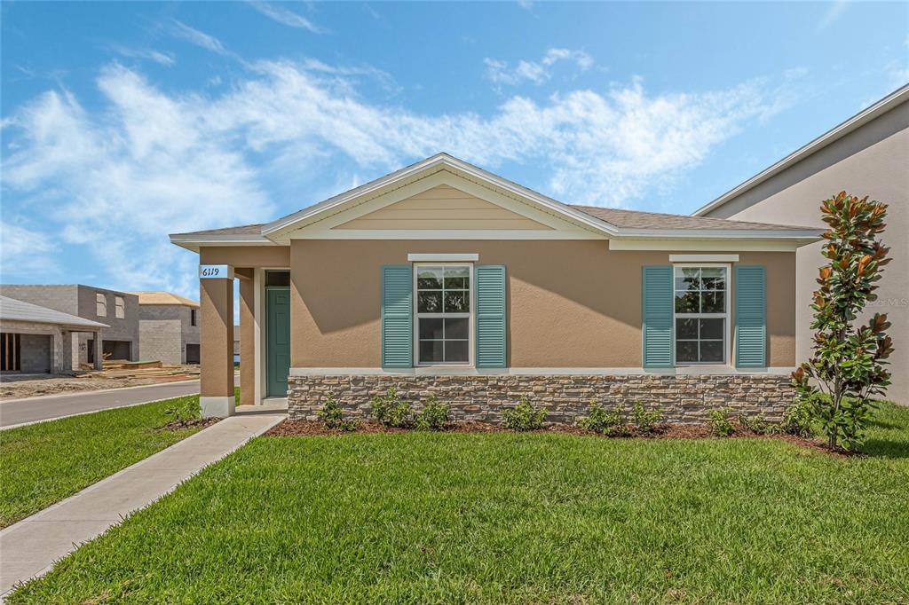 front view of house with a yard