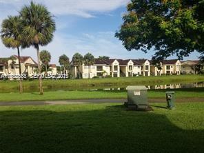 10360 Southwest 150th Court, Unit 12104 Miami, FL 33196 - Photo 19 of 23 a view of a park with large trees