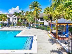 10360 Southwest 150th Court, Unit 12104 Miami, FL 33196 - Photo 21 of 23 a view of a volley ball court