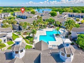 10360 Southwest 150th Court, Unit 12104 Miami, FL 33196 - Photo 22 of 23 an outdoor space with furniture