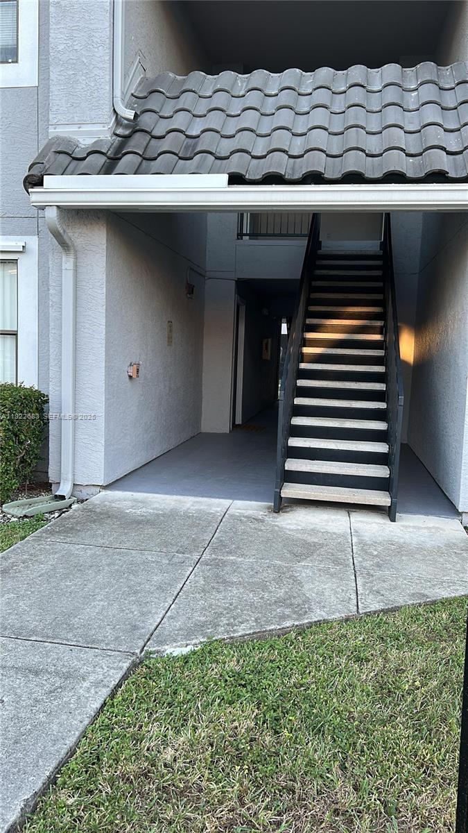 10360 Southwest 150th Court, Unit 12104 Miami, FL 33196 - Photo 10 of 23 a backyard of a house