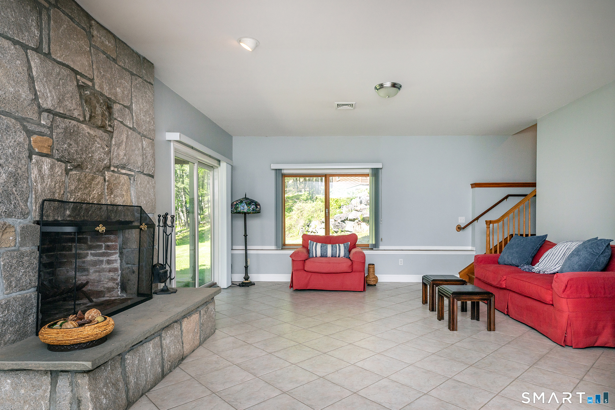 3 Old Forest Road Sherman, CT 06784 - Photo 25 of 38 a living room with furniture and a fireplace