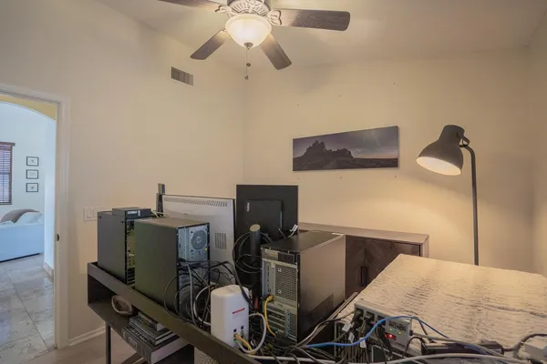 a view of a workspace with furniture
