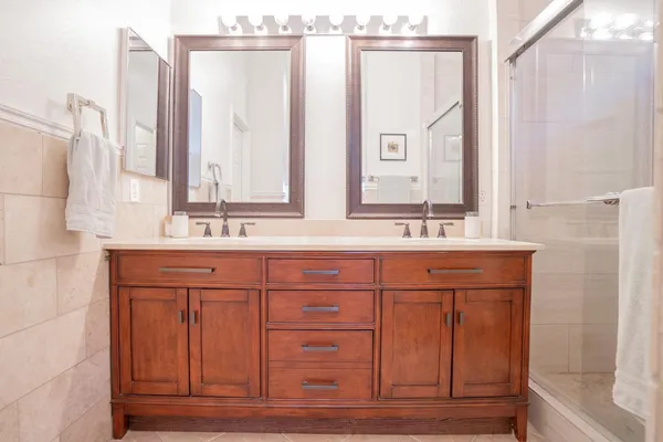 a bathroom with a sink and a mirror