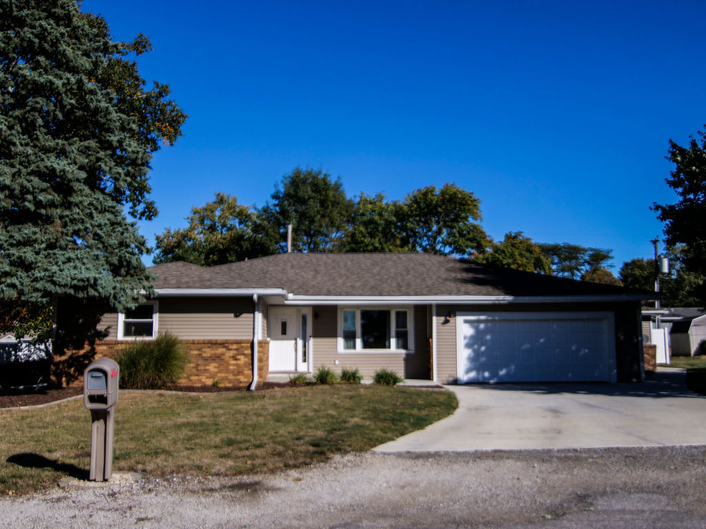 11 Kennedy Court Philo, IL 61864 - Photo 1 of 35 a front view of a house with a yard and garage