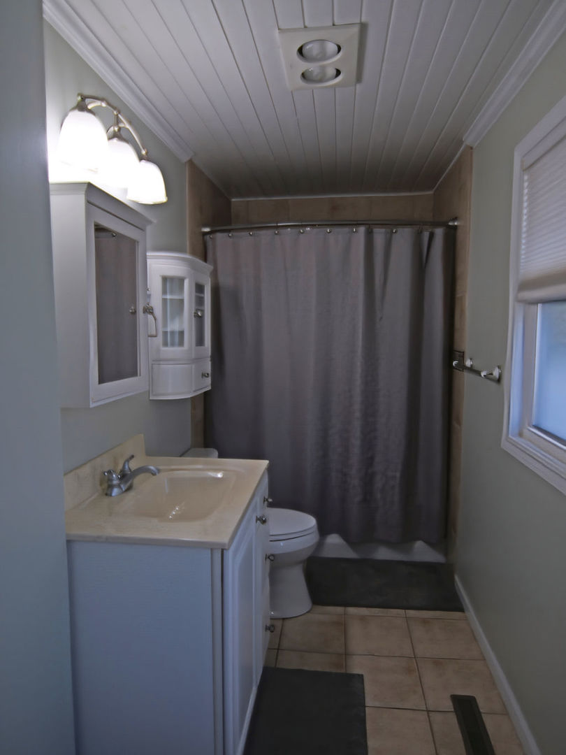 11 Kennedy Court Philo, IL 61864 - Photo 18 of 35 a bathroom with a sink a toilet and shower