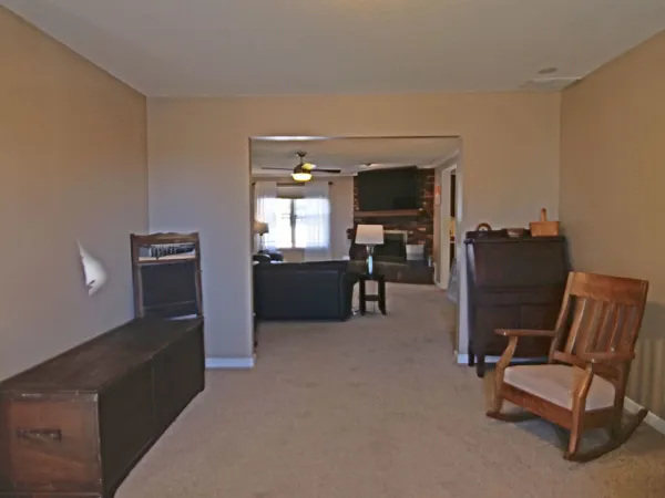 a view of workspace with furniture and cabinet