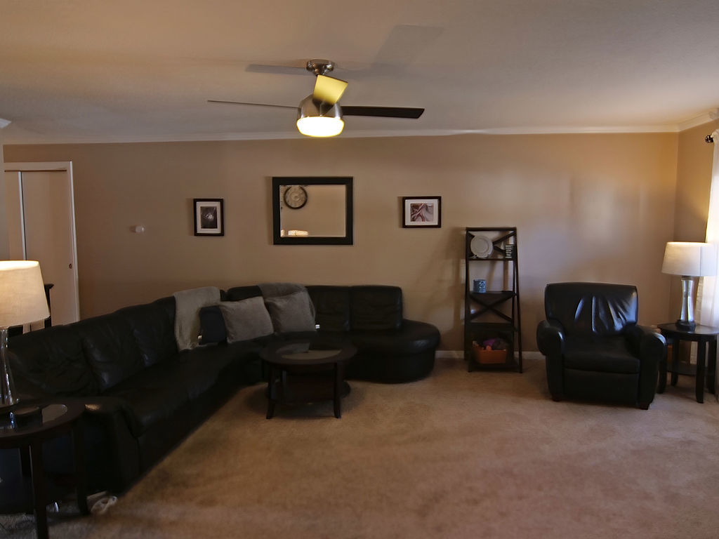 11 Kennedy Court Philo, IL 61864 - Photo 6 of 35 a living room with furniture and a lamp
