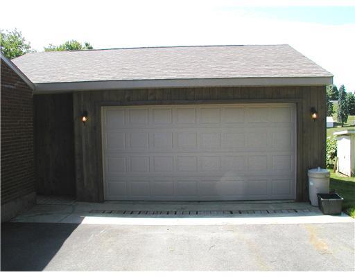 165 Evans City Road Butler, PA 16001 - Photo 3 of 18 Exterior Front. Newer Garage! 24x30!!
