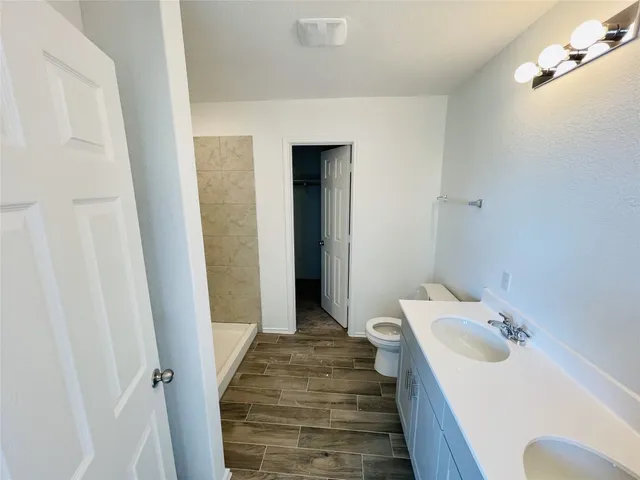 a bathroom with a sink and mirror