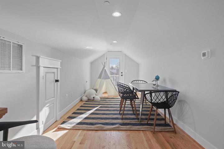 2806 Norbeck Road Silver Spring, MD 20906 - Photo 33 of 41 a view of a dining room with furniture and wooden floor