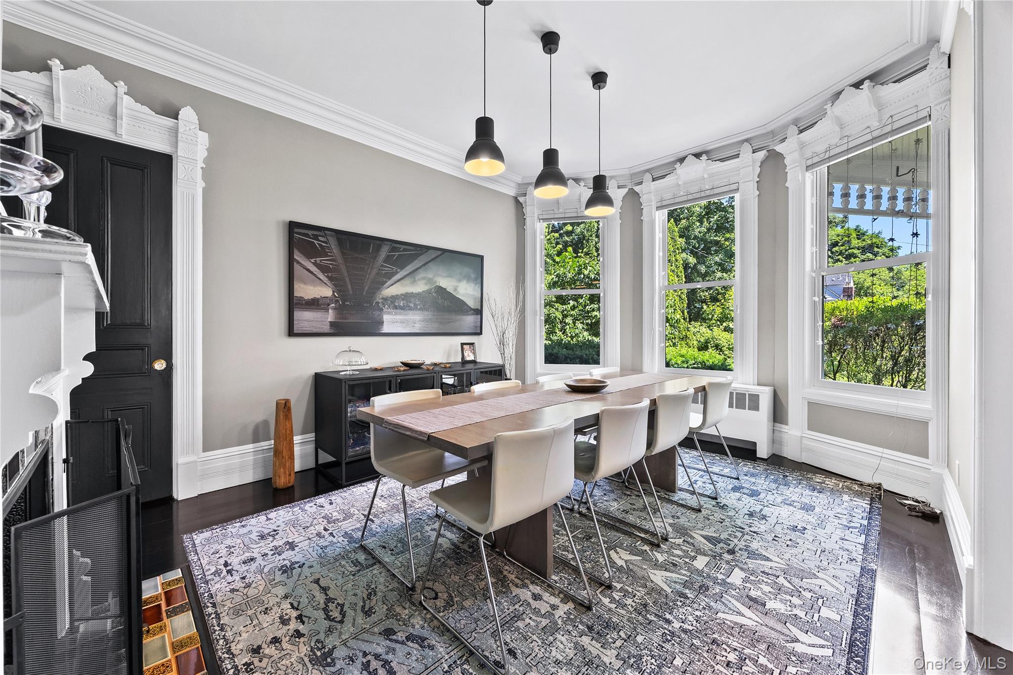 19 Howe Place Bronxville, NY 10708 - Photo 9 of 37 Formal dining area featuring dark wood-finish flooring