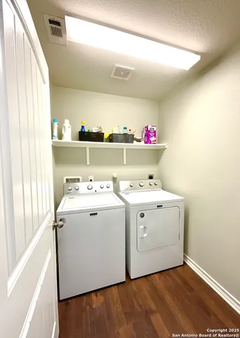 a utility room with washer and dryer