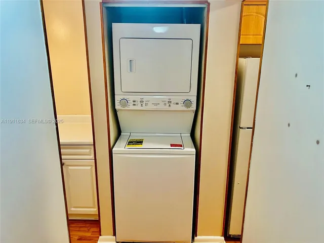 a view of front door with wooden floor