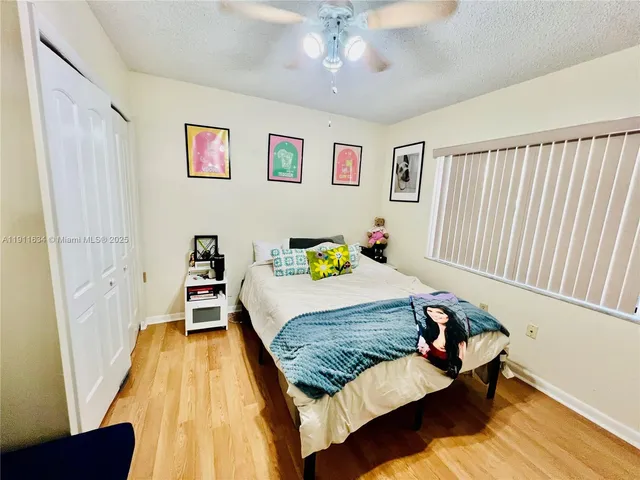 a bed room with a bed and a couch