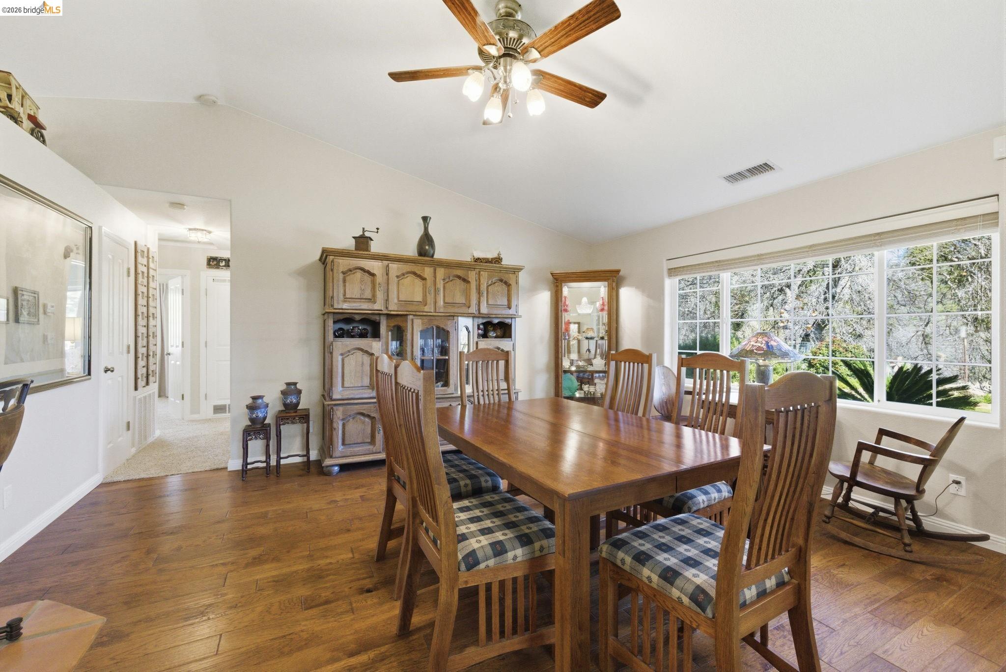 5356 Dogtown Road Coulterville, CA 95311 - Photo 31 of 60 a dining room with furniture window and wooden floor