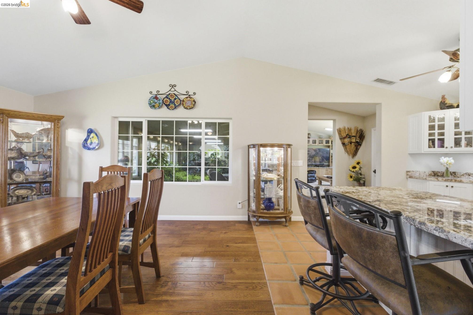 5356 Dogtown Road Coulterville, CA 95311 - Photo 33 of 60 a view of a dining room with furniture and a large window