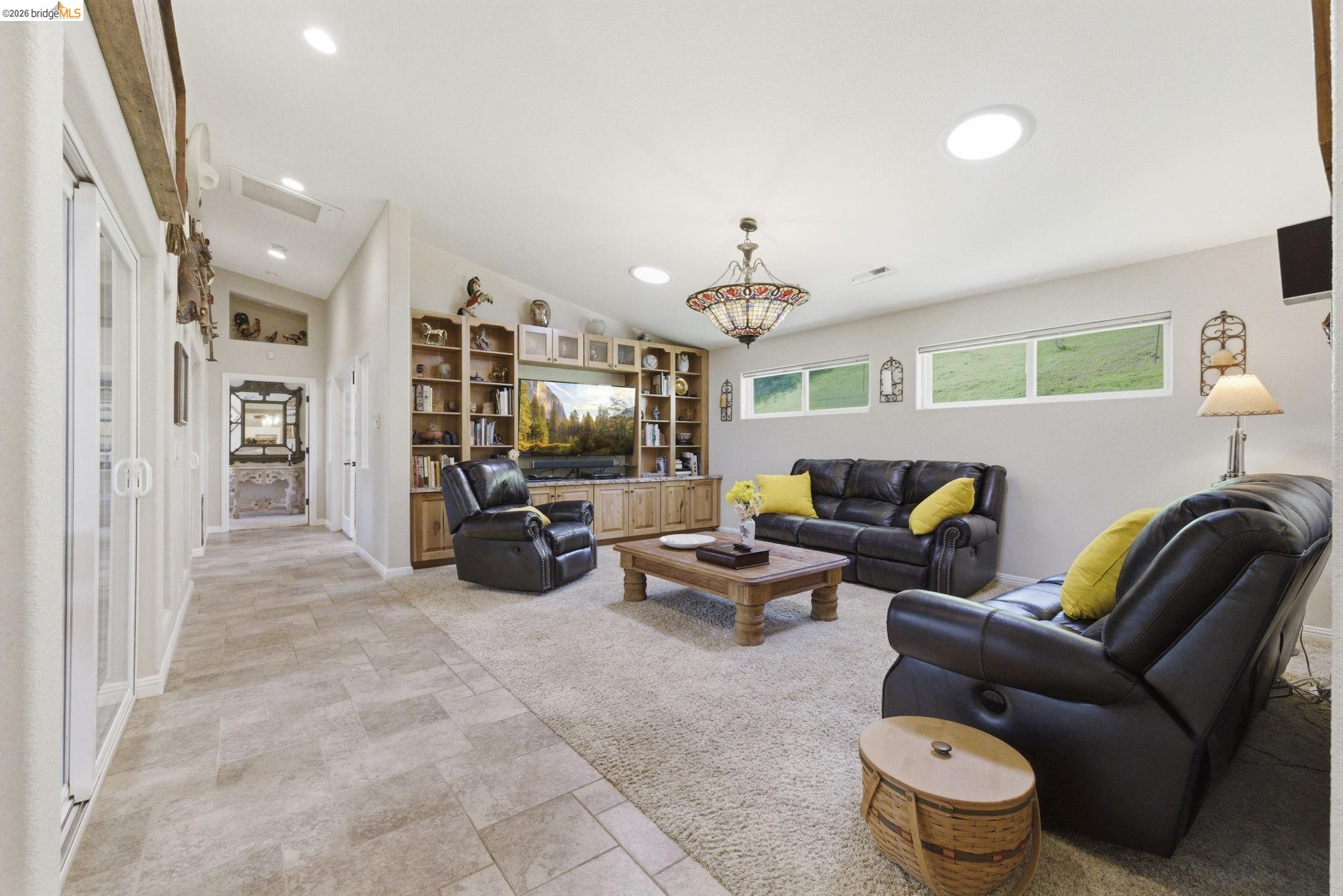 5356 Dogtown Road Coulterville, CA 95311 - Photo 34 of 60 a living room with furniture and a flat screen tv