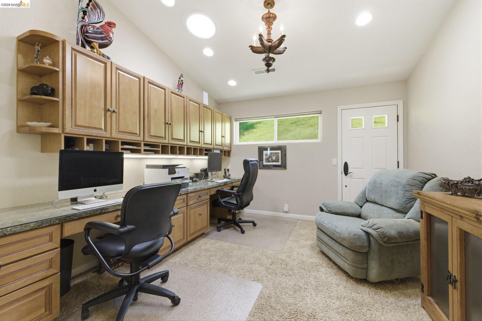 5356 Dogtown Road Coulterville, CA 95311 - Photo 36 of 60 a view of a livingroom with workspace and a couch