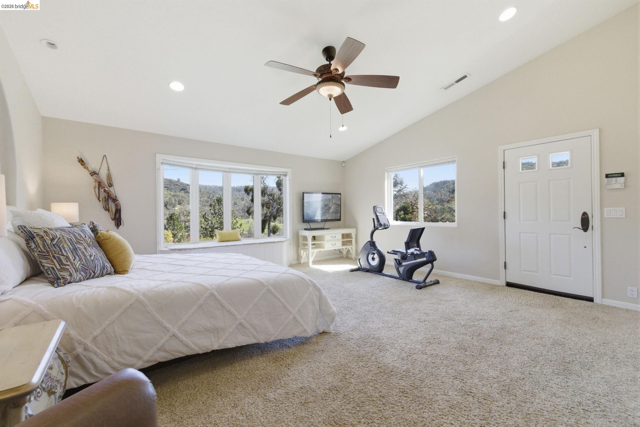 5356 Dogtown Road Coulterville, CA 95311 - Photo 37 of 60 a bed room with a bed and a chair