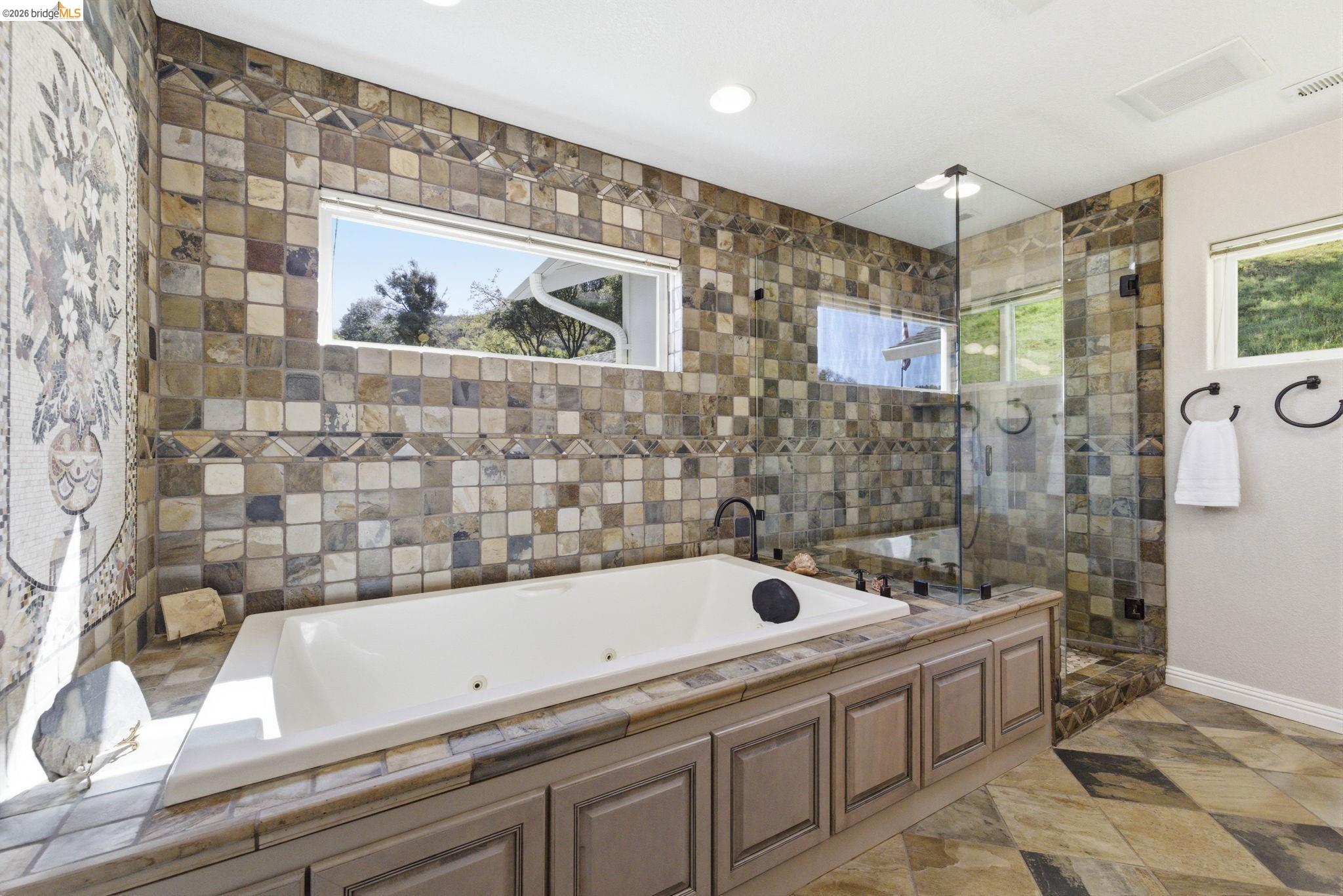5356 Dogtown Road Coulterville, CA 95311 - Photo 42 of 60 a bathroom with a sink and a bathtub